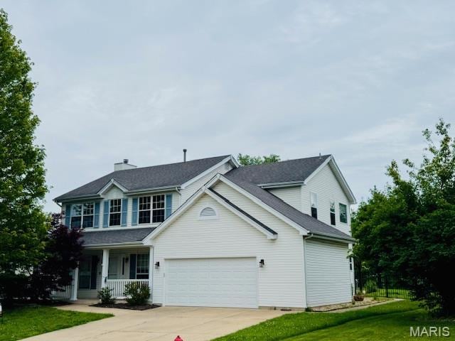 122 Tennessee Walker Way, Saint Peters, MO 63376 - traditional-style house featuring covered porch, an attached garage, and driveway