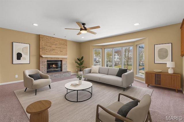 122 Tennessee Walker Way, Saint Peters, MO 63376 - living room with carpet floors, a ceiling fan, baseboards, recessed lighting, and a fireplace