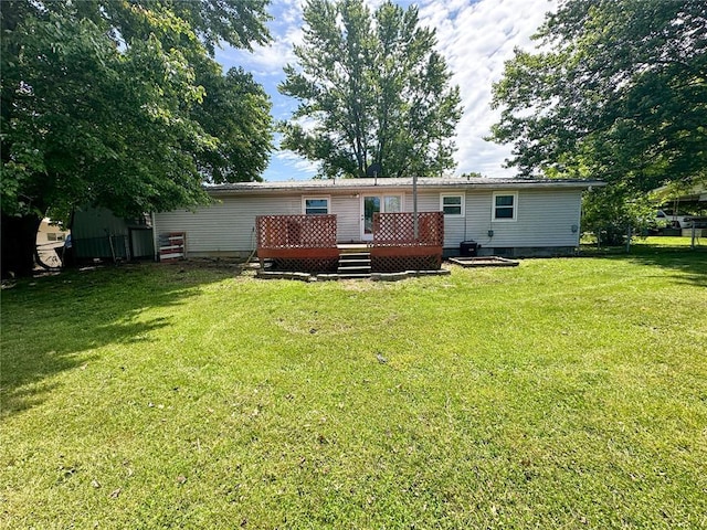 1110 W 3rd St, Salem, MO 65560 - rear view of property featuring a wooden deck and a lawn