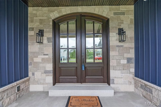 116 Brian Trl, Arnold, MO 63010 - entrance to property with french doors, board and batten siding, and stone siding