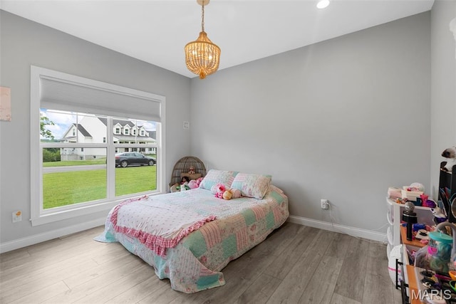 116 Brian Trl, Arnold, MO 63010 - bedroom featuring a chandelier, baseboards, wood finished floors, and recessed lighting