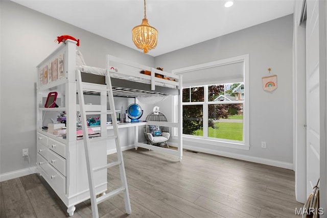 116 Brian Trl, Arnold, MO 63010 - bedroom with a chandelier, wood finished floors, baseboards, and recessed lighting