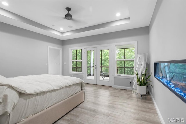 116 Brian Trl, Arnold, MO 63010 - bedroom featuring access to exterior, multiple windows, french doors, a tray ceiling, and recessed lighting