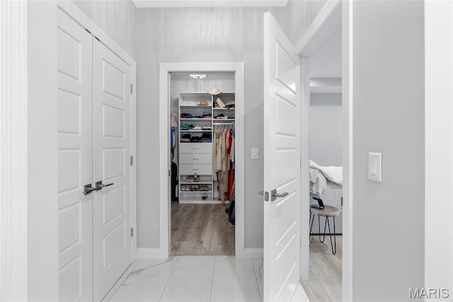 116 Brian Trl, Arnold, MO 63010 - corridor featuring baseboards and light marble finish floors