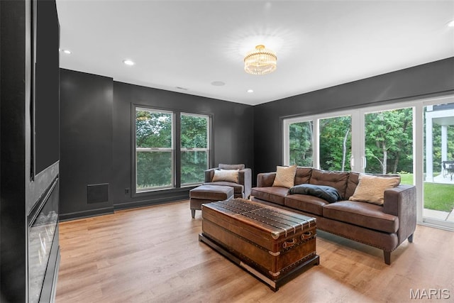 116 Brian Trl, Arnold, MO 63010 - living area with plenty of natural light, light wood-style floors, a chandelier, and recessed lighting