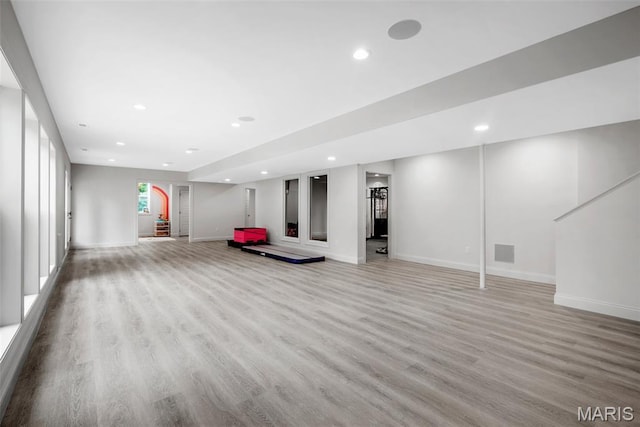 116 Brian Trl, Arnold, MO 63010 - unfurnished living room with light wood-style floors, recessed lighting, and baseboards