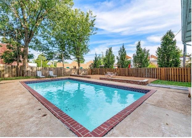 514 S Gore Ave, Saint Louis, MO 63119 - view of swimming pool featuring a patio and a fenced backyard