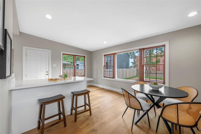 514 S Gore Ave, Saint Louis, MO 63119 - dining space featuring vaulted ceiling, recessed lighting, light wood finished floors, and baseboards