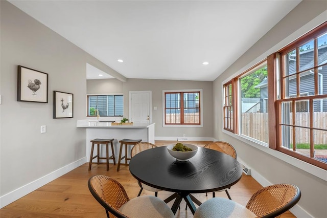 514 S Gore Ave, Saint Louis, MO 63119 - dining room with baseboards, light wood-style flooring, and recessed lighting