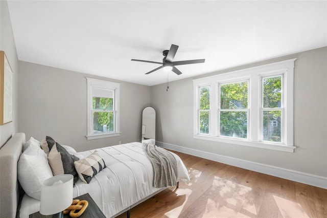 514 S Gore Ave, Saint Louis, MO 63119 - bedroom with baseboards, wood finished floors, and a ceiling fan