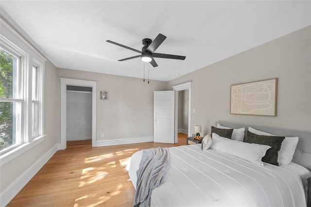 514 S Gore Ave, Saint Louis, MO 63119 - bedroom featuring light wood-style flooring, baseboards, and a ceiling fan