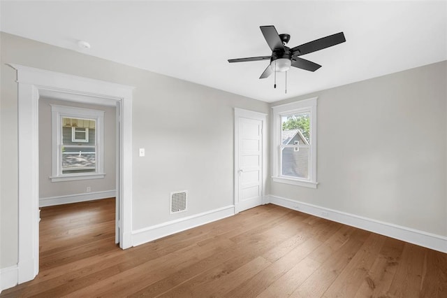 514 S Gore Ave, Saint Louis, MO 63119 - unfurnished room featuring baseboards, wood-type flooring, and a ceiling fan