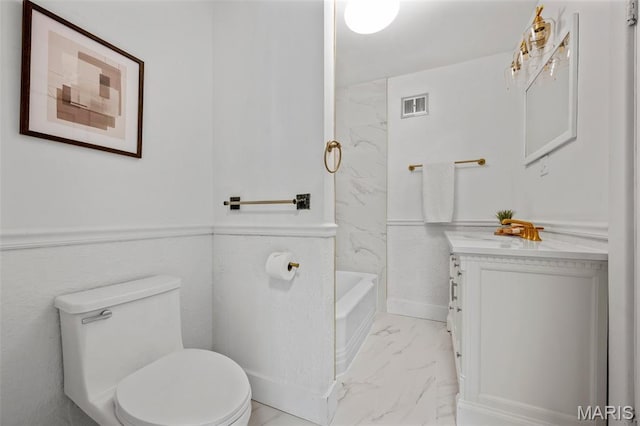 514 S Gore Ave, Saint Louis, MO 63119 - bathroom featuring marble look tiles, vanity, and shower / tub combination