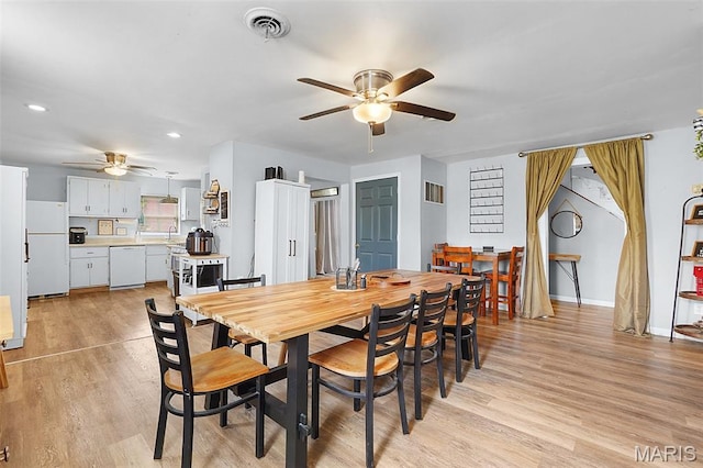 401 S Main St, New Florence, MO 63363 - dining area featuring ceiling fan, light wood-type flooring, recessed lighting, and baseboards