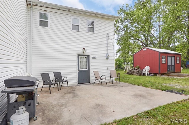401 S Main St, New Florence, MO 63363 - back of property with a patio and a lawn