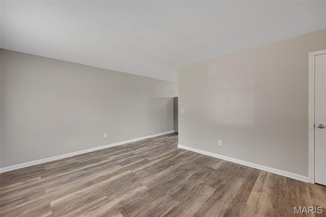 1448 Kathleen Dr, Wentzville, MO 63385 - unfurnished room with wood finished floors and baseboards