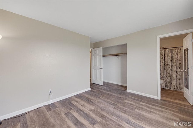 1448 Kathleen Dr, Wentzville, MO 63385 - unfurnished bedroom featuring wood finished floors and a closet
