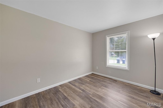 1448 Kathleen Dr, Wentzville, MO 63385 - unfurnished room with wood finished floors