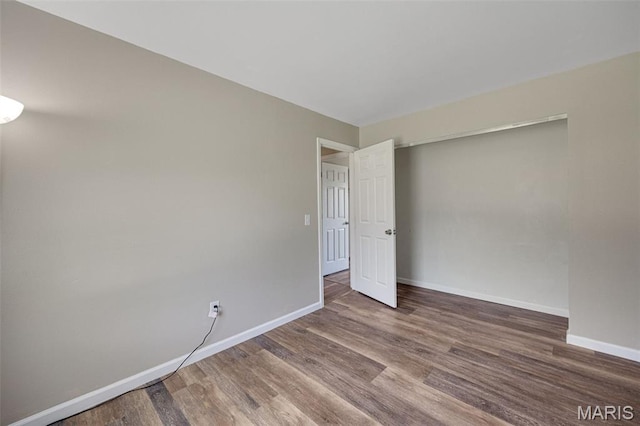 1448 Kathleen Dr, Wentzville, MO 63385 - unfurnished room featuring wood finished floors