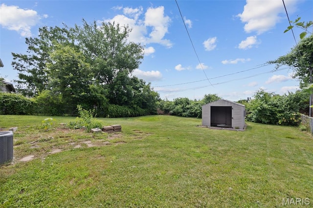 1448 Kathleen Dr, Wentzville, MO 63385 - view of grassy yard featuring a storage unit