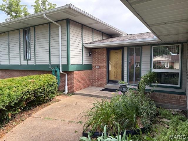 678 Henry Ave, Manchester, MO 63011 - entrance to property with brick siding