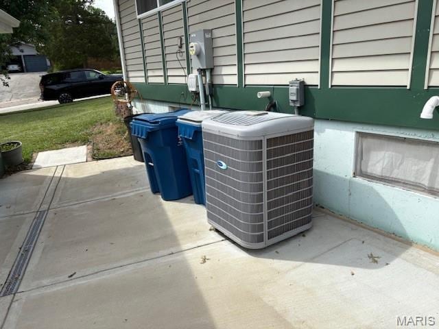 678 Henry Ave, Manchester, MO 63011 - exterior view of a central air condition unit and electric meter