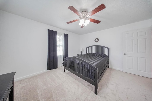 1707 S Mcarthur Ave, Salem, MO 65560 - bedroom with carpet floors, baseboards, and a ceiling fan
