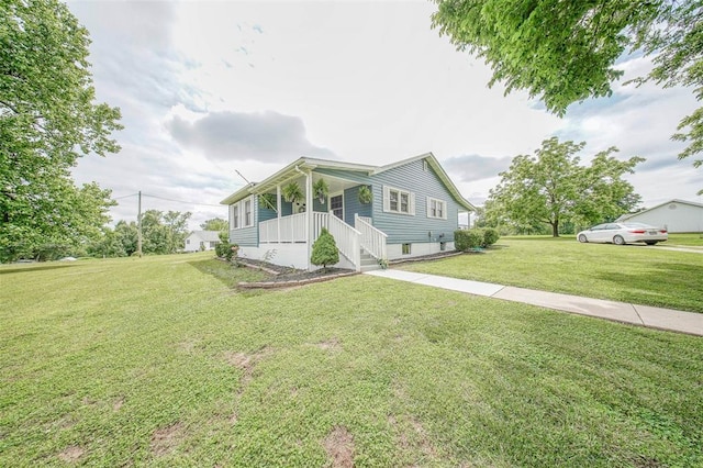 1707 S Mcarthur Ave, Salem, MO 65560 - view of front facade with a front yard and covered porch