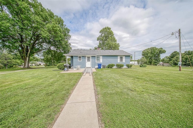 1707 S Mcarthur Ave, Salem, MO 65560 - view of front of home featuring a front lawn and a chimney
