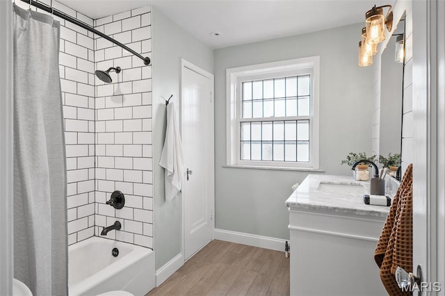 436 W Point Ct, Saint Louis, MO 63130 - full bathroom with wood finished floors, vanity, and shower / bath combo