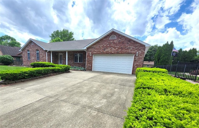 103 Northview Dr, Collinsville, IL 62234 - single story home featuring brick siding, an attached garage, and driveway