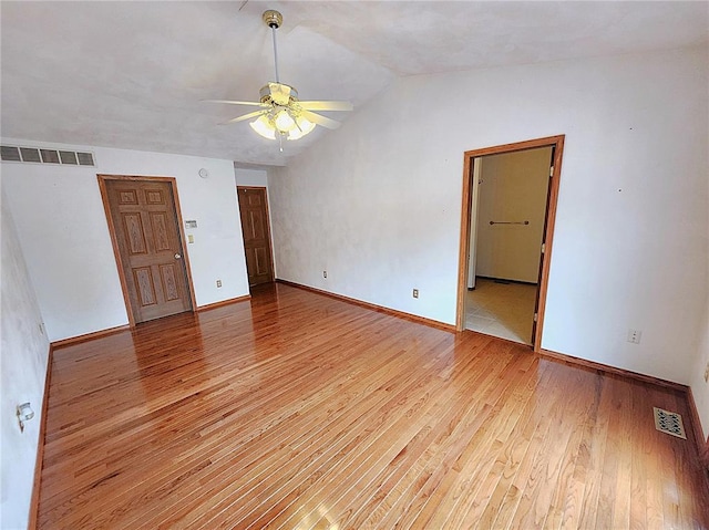 103 Northview Dr, Collinsville, IL 62234 - unfurnished room featuring ceiling fan, lofted ceiling, light wood-type flooring, and baseboards