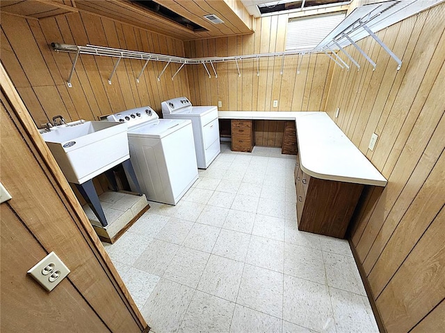 103 Northview Dr, Collinsville, IL 62234 - washroom featuring wooden walls and washer and clothes dryer