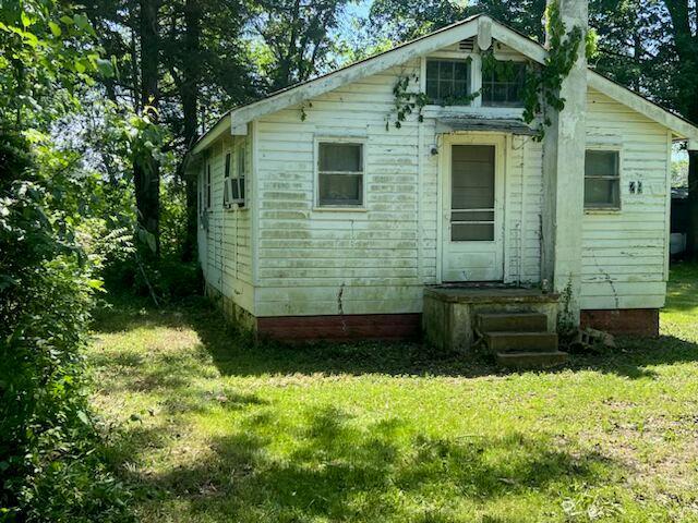 8048 Riverview Dr, Dittmer, MO 63023 - rear view of property featuring a yard and a chimney