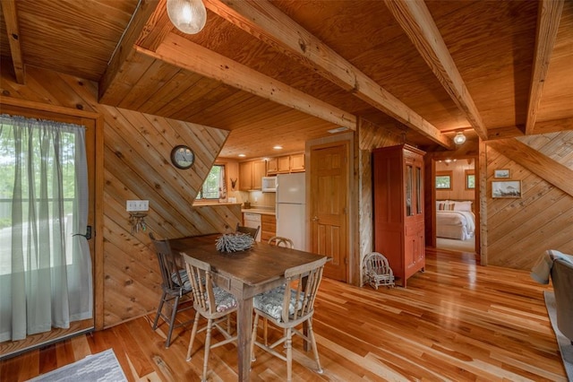 2441 Alpine Lake Dr, Innsbrook, MO 63390 - dining area with wood walls, light wood-type flooring, and wood ceiling with exposed beams