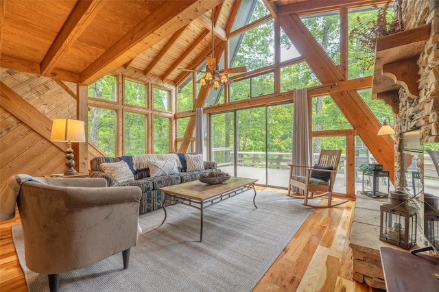 2441 Alpine Lake Dr, Innsbrook, MO 63390 - living area featuring hardwood / wood-style floors, high vaulted ceiling, and wood ceiling with exposed beams