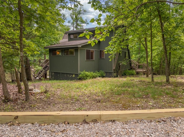 2441 Alpine Lake Dr, Innsbrook, MO 63390 - view of property exterior featuring stairs and a deck