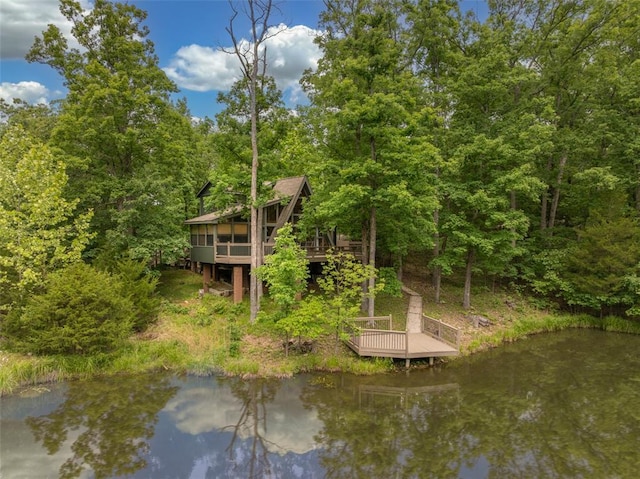 2441 Alpine Lake Dr, Innsbrook, MO 63390 - back of house featuring a wooded view and a deck with water view