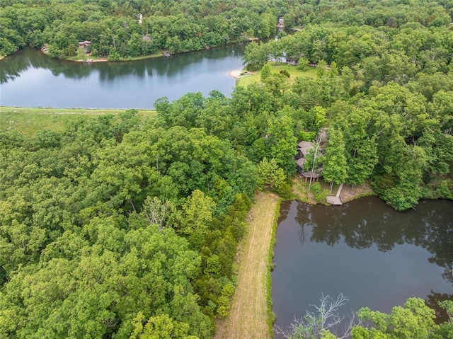 2441 Alpine Lake Dr, Innsbrook, MO 63390 - aerial overview of property's location with a heavily wooded area and a nearby body of water