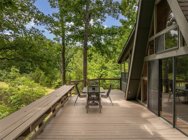 2441 Alpine Lake Dr, Innsbrook, MO 63390 - wooden terrace with outdoor dining area