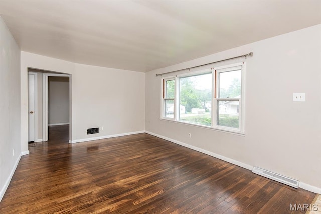 190 Anistasia Dr, Saint Louis, MO 63135 - spare room featuring dark wood-style floors and baseboards