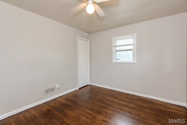190 Anistasia Dr, Saint Louis, MO 63135 - unfurnished room with baseboards, wood finished floors, and a ceiling fan