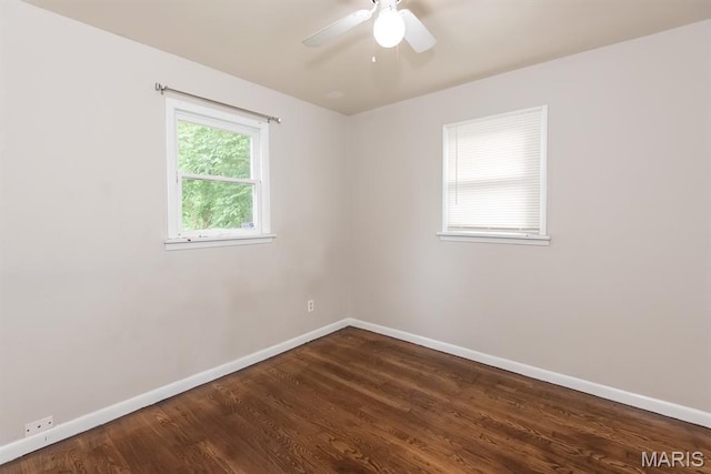 190 Anistasia Dr, Saint Louis, MO 63135 - unfurnished room featuring baseboards, dark wood-style floors, and ceiling fan