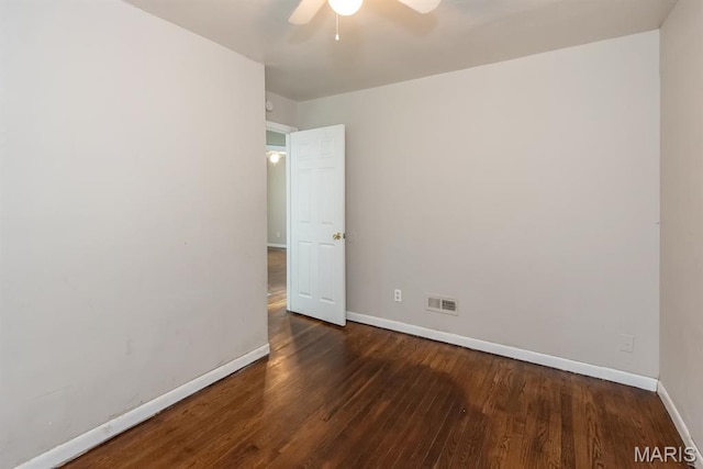 190 Anistasia Dr, Saint Louis, MO 63135 - empty room with baseboards, wood finished floors, and a ceiling fan
