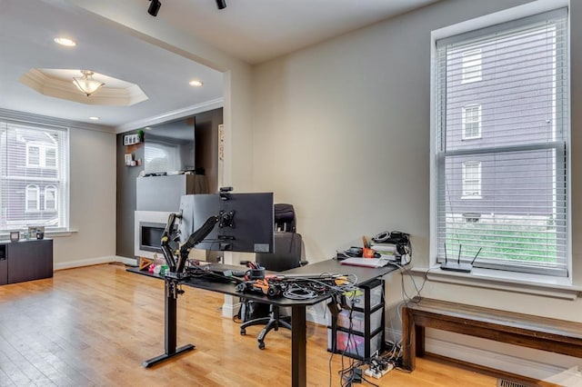 2628 Indiana Ave, Saint Louis, MO 63118 - home office featuring healthy amount of natural light, wood finished floors, ornamental molding, a raised ceiling, and recessed lighting