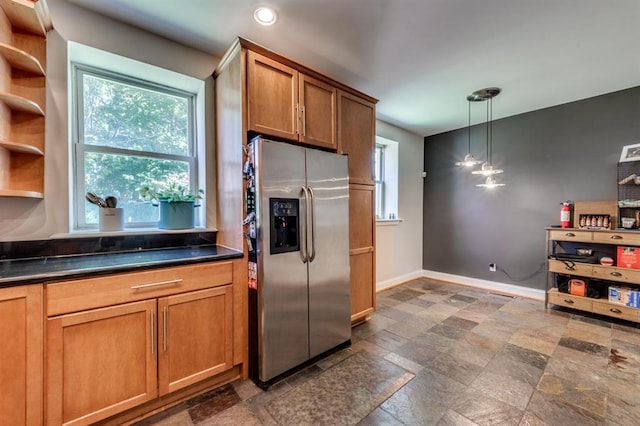 2628 Indiana Ave, Saint Louis, MO 63118 - kitchen featuring stainless steel fridge, dark countertops, baseboards, plenty of natural light, and recessed lighting