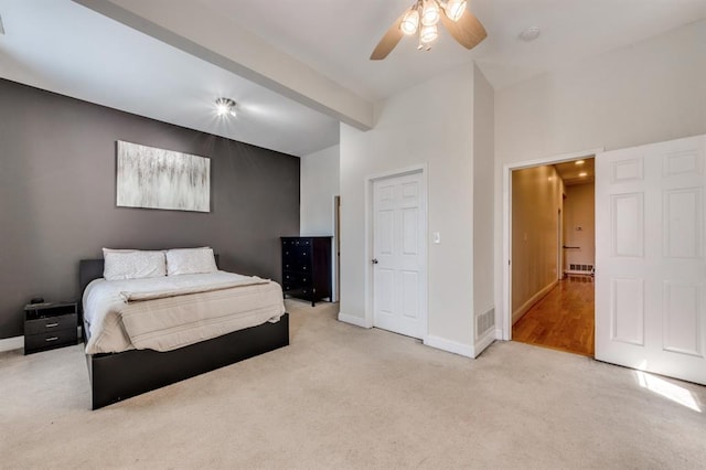 2628 Indiana Ave, Saint Louis, MO 63118 - bedroom with carpet flooring, baseboards, a ceiling fan, and beam ceiling