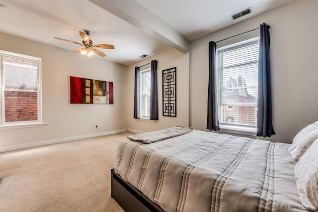 2628 Indiana Ave, Saint Louis, MO 63118 - carpeted bedroom with baseboards and ceiling fan