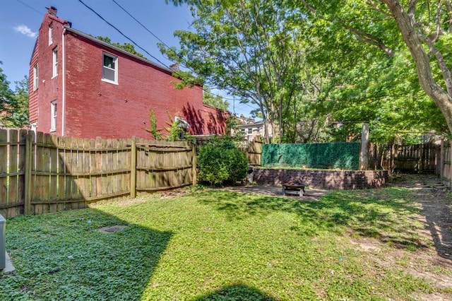2628 Indiana Ave, Saint Louis, MO 63118 - view of yard featuring a fire pit