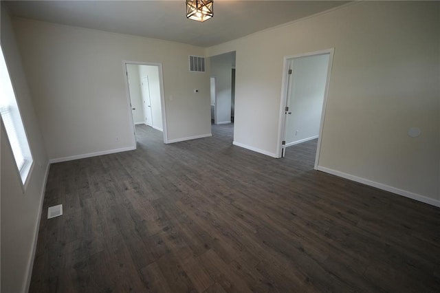 300 W Baker St, Gillespie, IL 62033 - unfurnished room featuring dark wood-style floors and baseboards